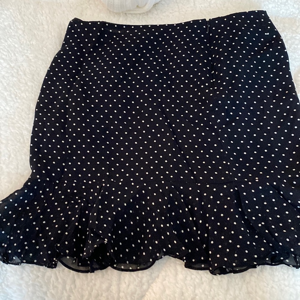 Size 12 gently worn Ralph Lauren black and white polka dot skirt with zipper.
